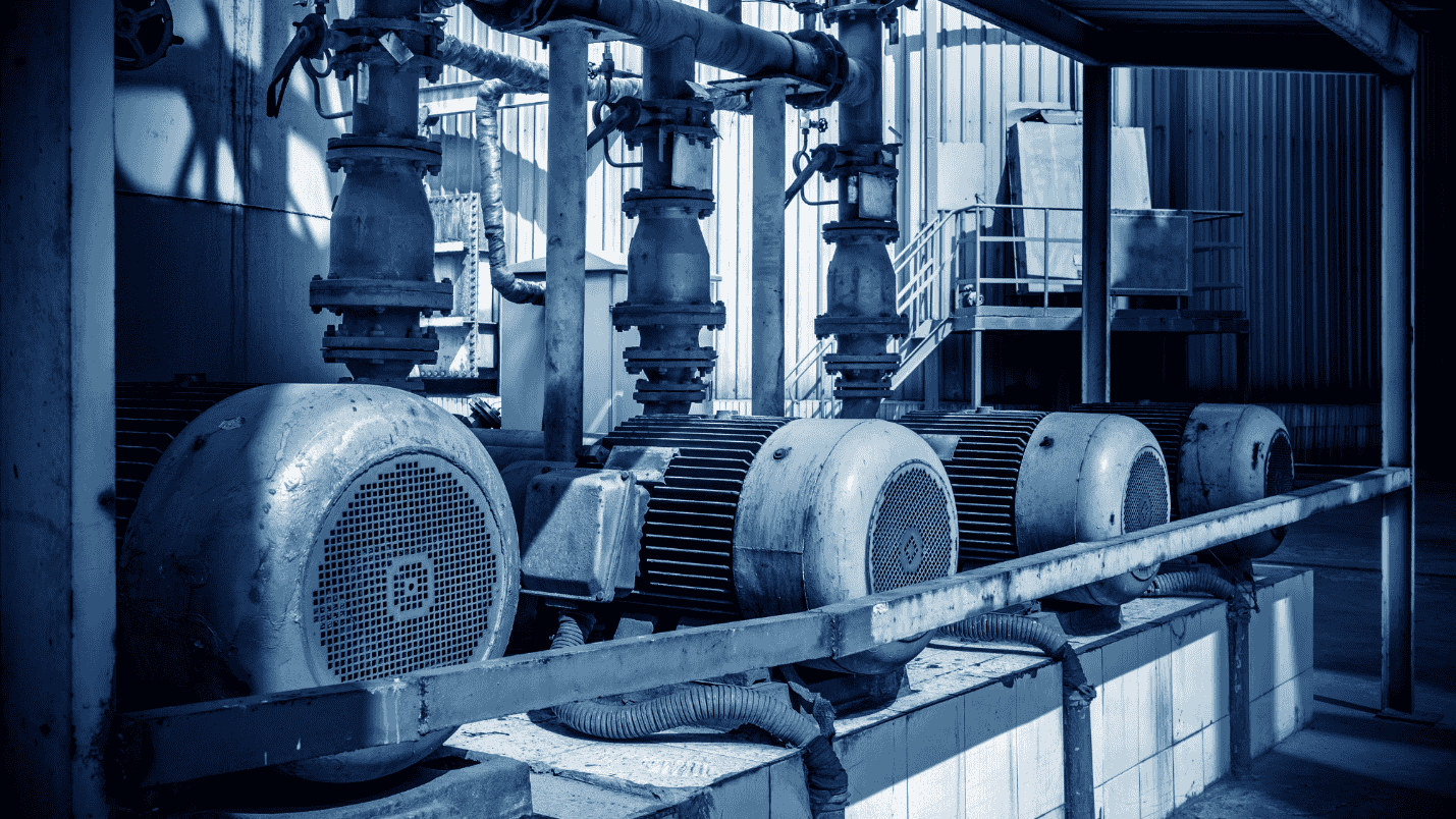 The inside of a commercial building where four electric generators are.